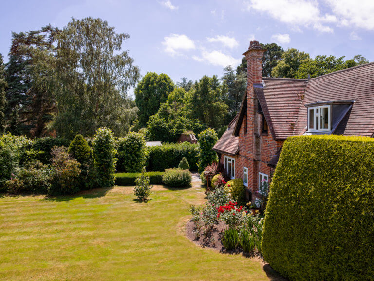 Garden view from a bedroom at Careys Manor Hotel