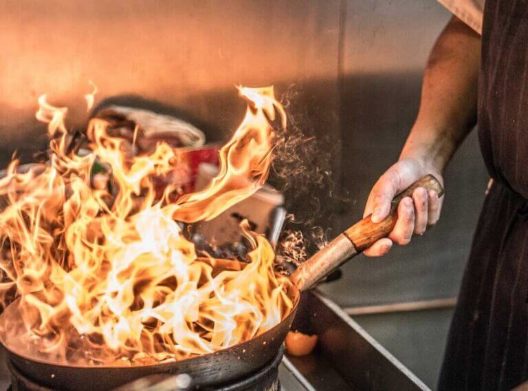 Wok frying ingredients at The Zen Garden Thai Restaurant