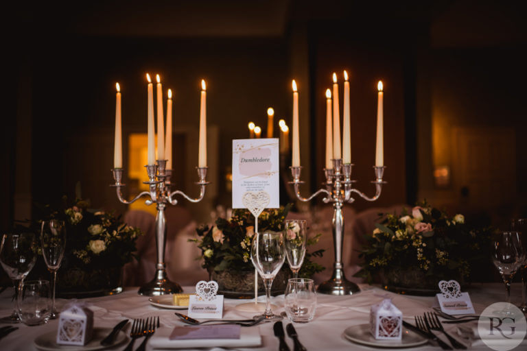 Wedding table set with candles and flowers