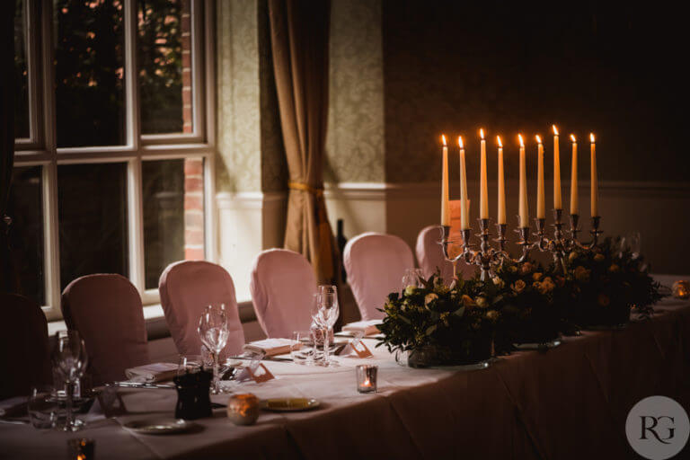 Wedding table set with candles and flowers
