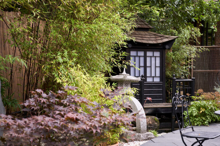 Tranquil gardens with Thai influence and leafy green trees