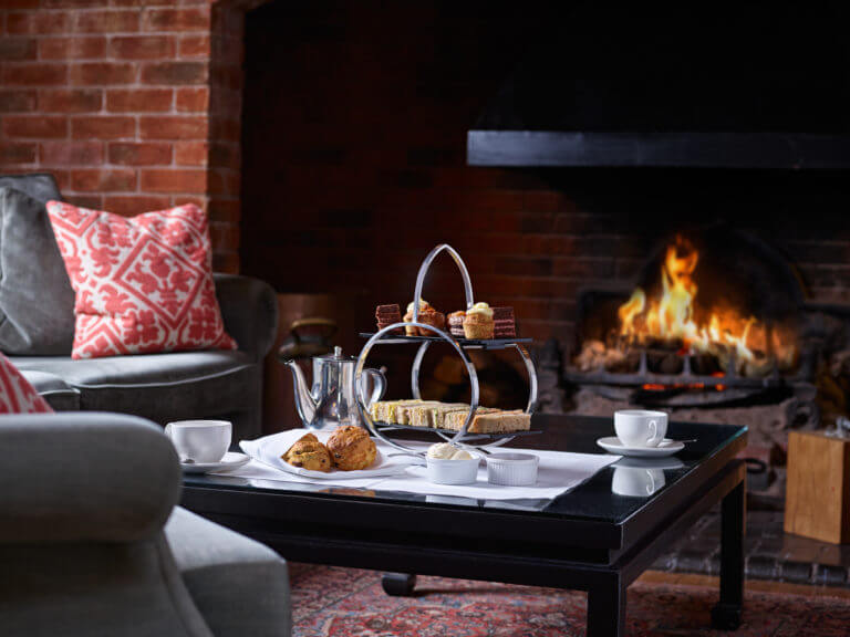 Afternoon Tea by a log fire at Careys Manor Hotel & SenSpa