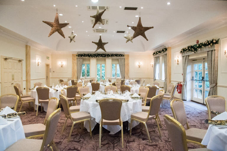 Christmas Party decorations in the Cedar Suite at Careys Manor Hotel & SenSpa