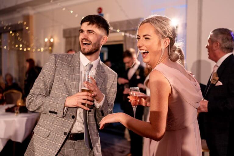 Guests laugh as they enjoy the evening reception