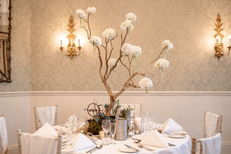 Close up of a table set for the wedding breakfast