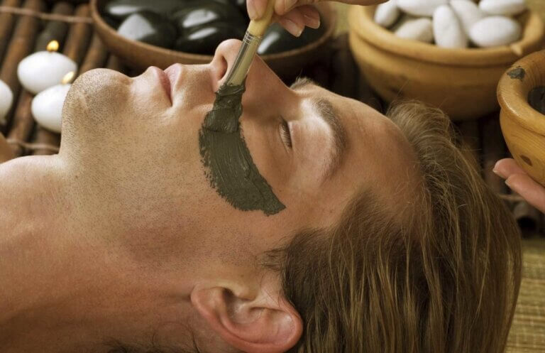 Man receiving facial spa treatment