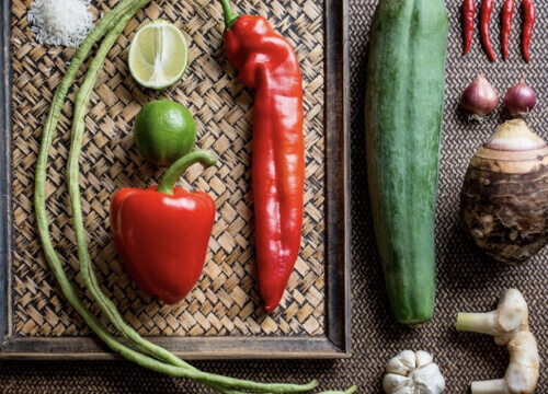 A selection of traditional Thai ingredients including pepper, lime, chili, ginger and garlic