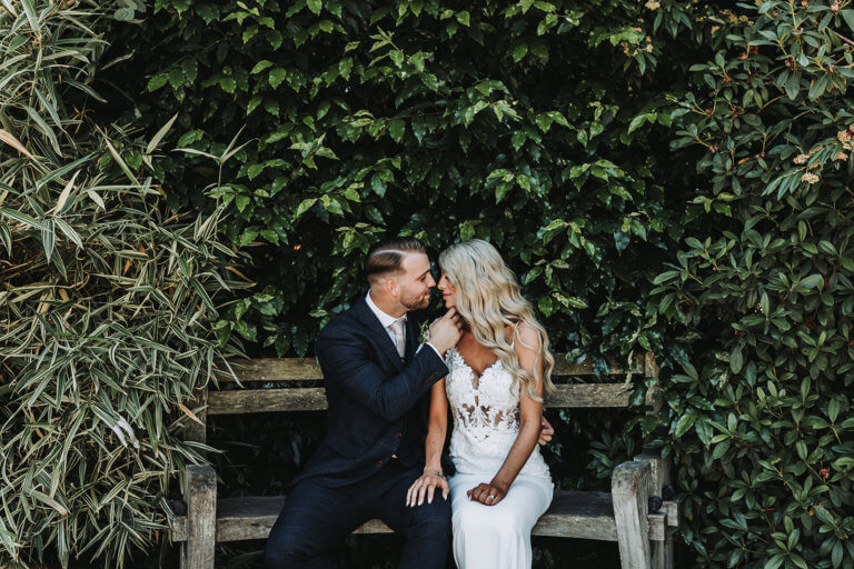 Bride and Groom pose for photos