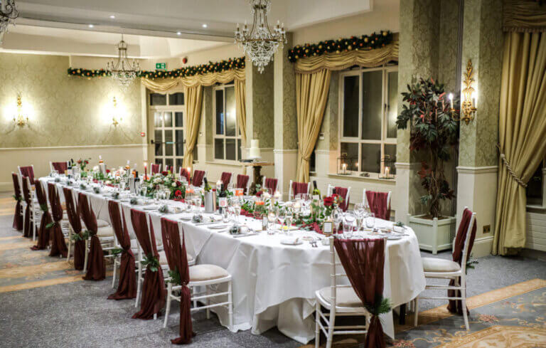 Manor Suite set for a wedding breakfast with one oval long table