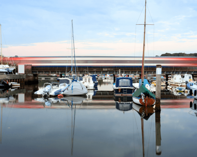 Train passing through the harbour to Lymington Pier station
