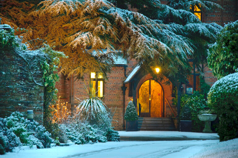 Careys Manor Hotel & SenSpa in Winter covered in snowfall