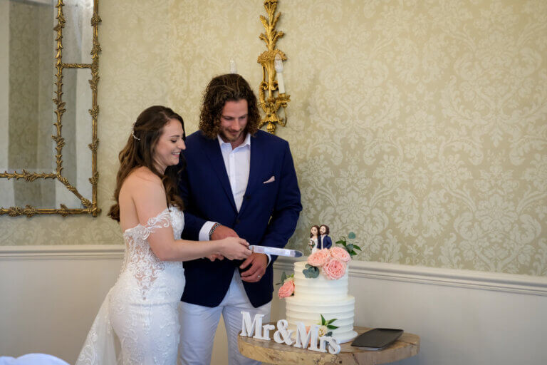 The Bride and Groom cut the cake