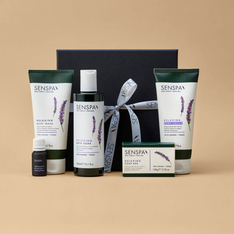 SenSpa relaxing gift set products and gift box stand against cream background